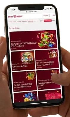 A person uses a smartphone to view the Ruby Reels promotions page with bonus offers.